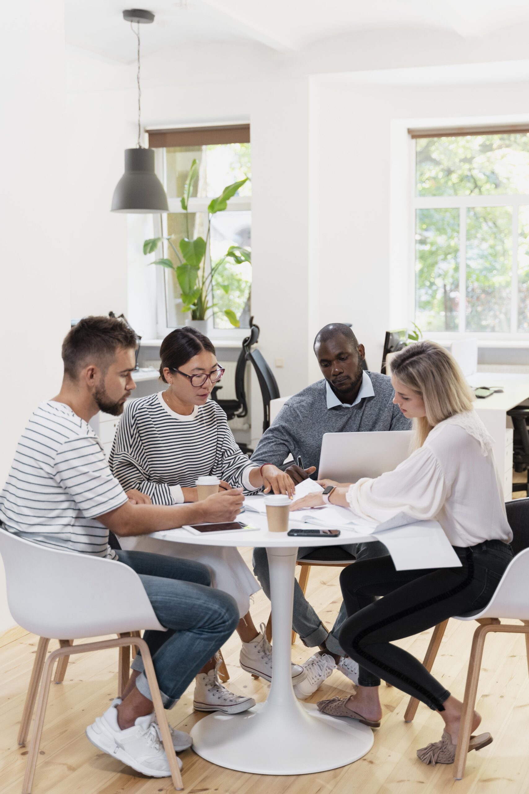 close-up-young-colleagues-having-meeting